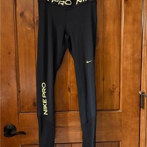 NikePro Kids Black and Yellow Leggings